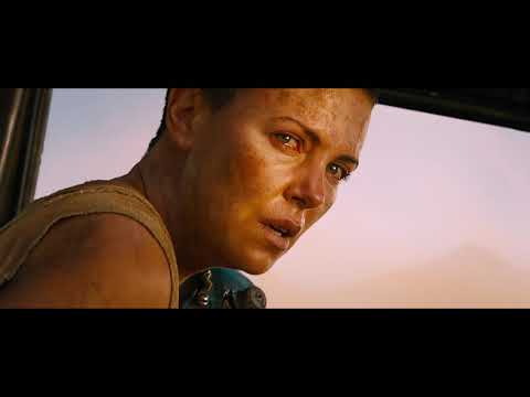 Trailer frame of Nux roaring inside the War Rig with sandstorm and lightning outside