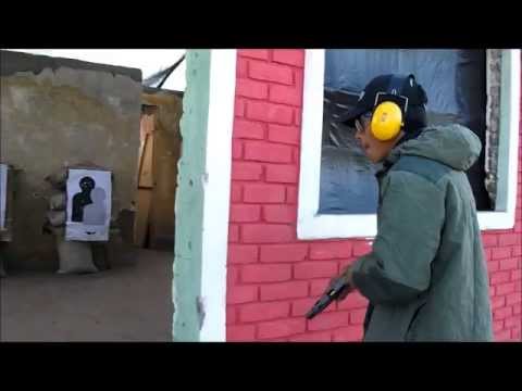 Disparando ah blancos con rehen Glock 19