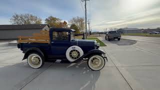 1930 Ford Model A Pickup Driving Away