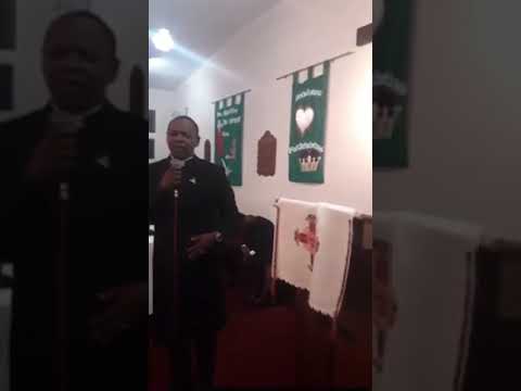 Rev Luxolo Mantini sings, “andinanto esandleni…”