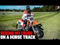 RACING MOTOCROSS BIKES AT 90MPH ROUND A HORSE TRACK