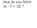 Solve 3x - 7 = -22