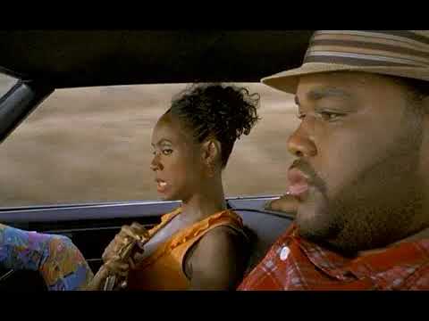 Trailer moment of reconciliations underscored by contemporary gospel textures in Kingdom Come (2001)