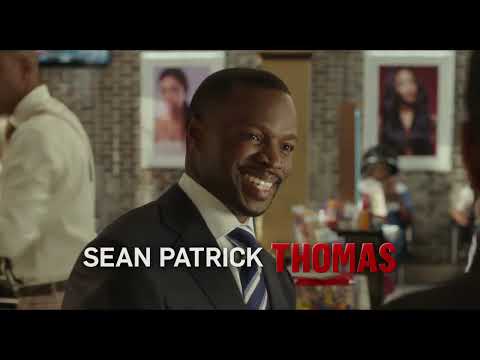 Trailer frame focusing on the women’s salon chairs and banter