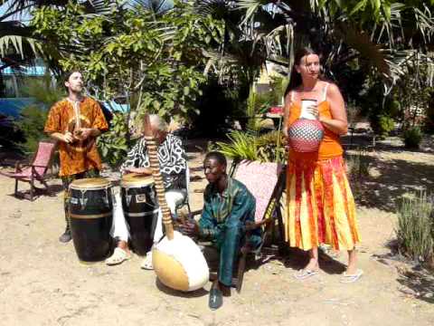 Jali Sherrifo Konteh plays Kora with friends at Gunjur Project Lodge, The Gambia