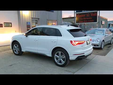 2020 Audi Q3 with Compustar Drone phone start and OEM key x3 Lock remote start