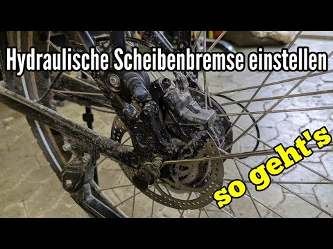 Adjusting hydraulic disc brakes on a bicycle