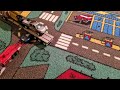 Corvette gets crushed under a truck.