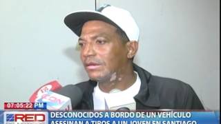 Desconocidos a bordo de un vehículo asesinan a tiros a un joven en Santiago