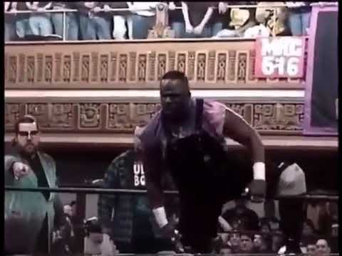The Dudley Boyz and Paul Heyman throw out a fan disrespecting the 10 bell salute to Rick Rude.