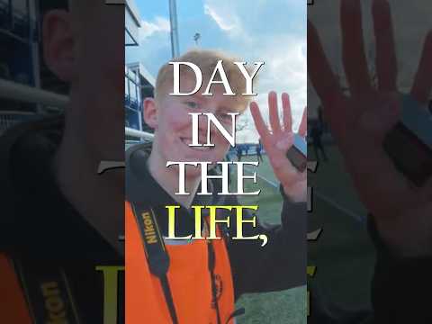 Still from the day in the life video with the title text overlaid