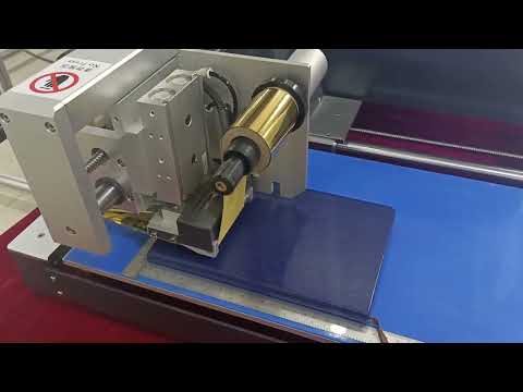 Digital hot foil stamping machine on hard bookcover