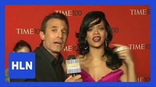 Rihanna shows AJ Hammer how to pronounce her name.