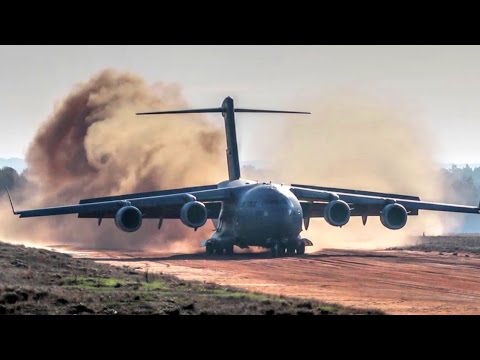 C-17 Dirt Airstrip Landing & Takeoff, Unloads AH-64.