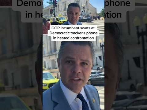 GOP incumbent swats at Democratic tracker's phone in heated confrontation