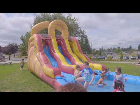 Check out our Triple Lane slide that can be used wet or dry.  Everyone needs our Volcano Falls at their next event