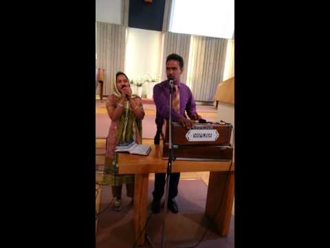 Pastor Latif Jacob and Razia Latif doing worship in Sweden