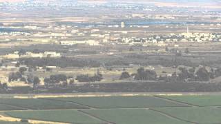 preview picture of video 'תצפית מרמת הגולן על אזור קוניטרה (סוריה) בתקופת מלחמת האזרחים 2013.'