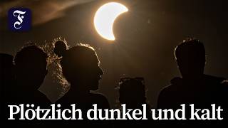 Staunen über partielle Sonnenfinsternis