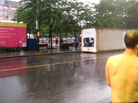 Martha Wash singing "It's Raining Men" while it is pouring rain at Divers/Cite in Montreal