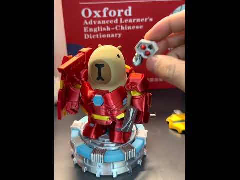 Women, you don’t understand men’s happiness. Kapibala, Iron Man armor, playing with something ve