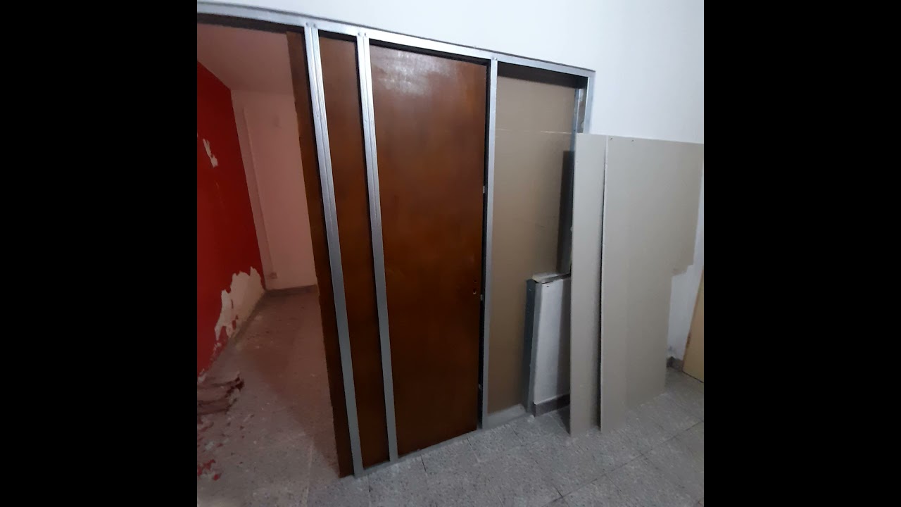 Como instalar porta de correr embutida na parede de drywall.