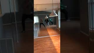 Friends are reenacting the slide scene from Risky Business, and the last one falls!