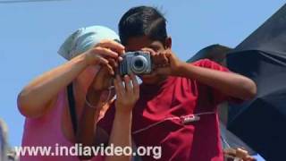 Boy with tourist at Vizhinjam beach