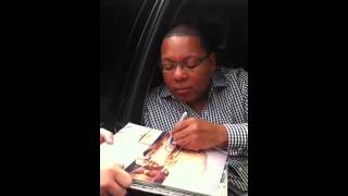 Wynton Marsalis Signing Autographs For Team Derek