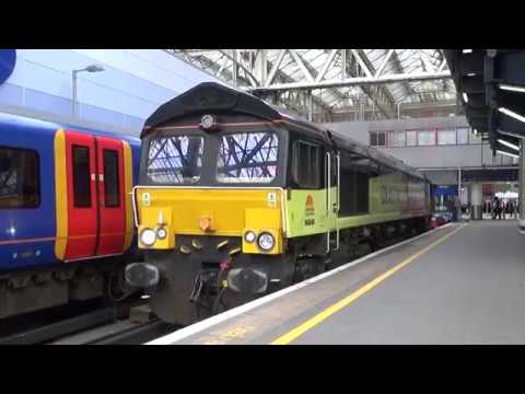 Colas Rail 66848 with mounted Track Guaging Equipment departing London Waterloo