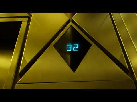 BEAUTIFUL 1987 Custom Otis Series 1 Elevonic 401 Traction Elevators at KPMG Tower, Montreal, QC