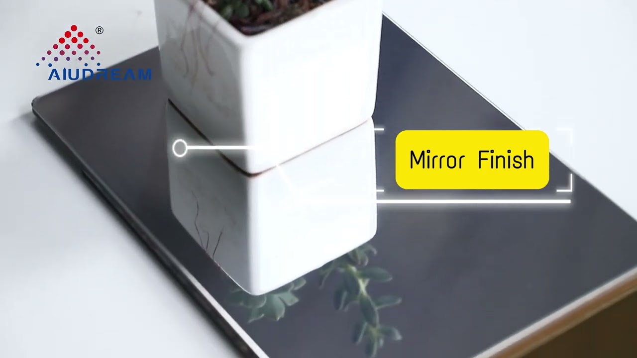 Continuous display of materials, mirror and brushed finish aluminum composite panels.