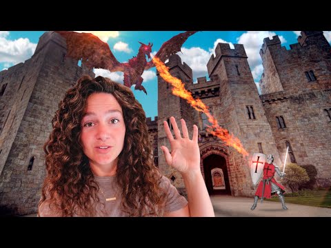 Woman with curly hair in the foreground at a castle as a red dragon breathes fire and a knight with a sword stands nearby.
