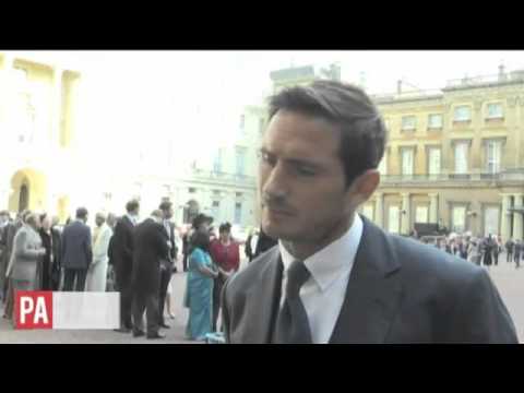 Chelsea legend Frank Lampard beams with pride after receiving an OBE