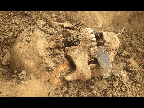 The Hell where Youth and Laughter go - WWII German cemetery exhumation