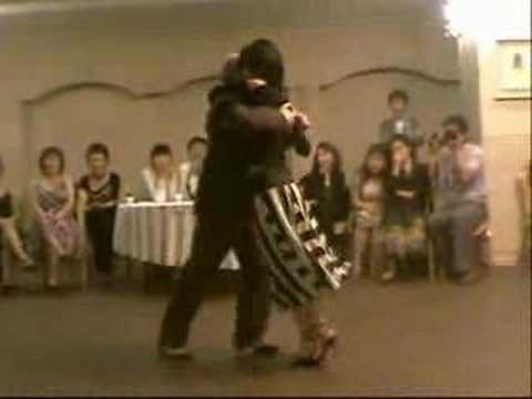  Ruben 'Milonga' Terbalca  and  Inkyoung Lee  are  dancing  to  the  milonga  "  Tamboriles  "