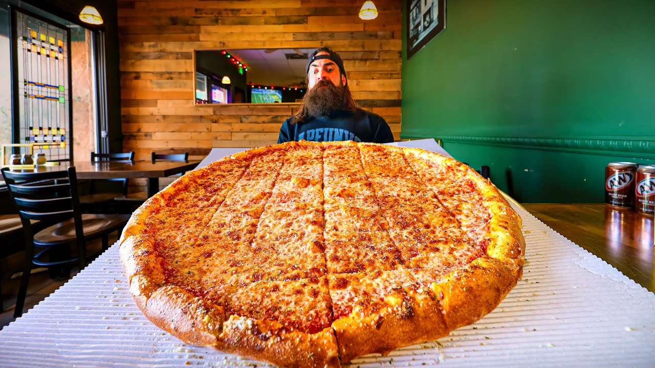 THIS PIZZA CHALLENGE HAS ONLY BEEN BEATEN ONCE...BY A TEAM OF TWO! | BeardMeatsFood