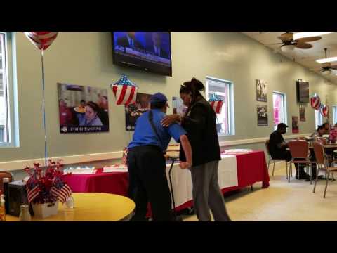 Ragan Cutting the cake.