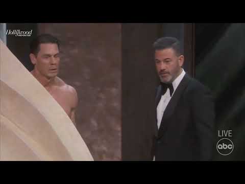 A n4k3d John Cena and Jimmy Kimmel bicker on stage at the 2024 #Oscars