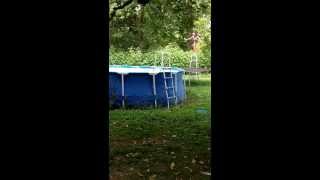 preview picture of video 'Jumped off the ladder into trampoline into the pool'