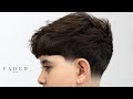 Textured Fringe Haircut With Low Taper Fade