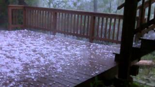 preview picture of video 'Downpour of golfball sized hail in St. Louis.'