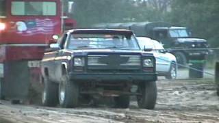 Chevy breaks driveshaft and front axle at truck pull.