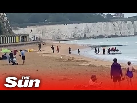 20 migrants including children land on Kent beach in front of stunned holidaymakers
