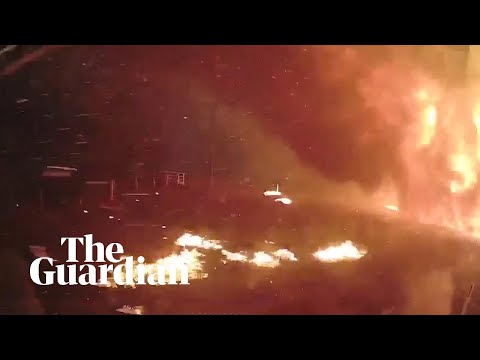 Dashcam footage shows how fast bushfires can move when the wind changes