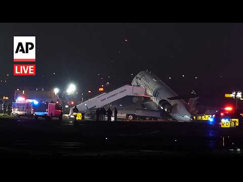 Air Canada flight collides with Port Authority vehicle at New York's LaGuardia Airport