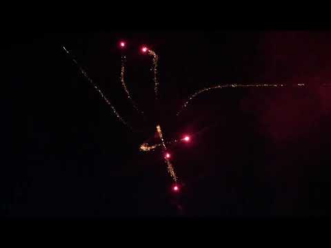 76 Pro Line: Red Swimming Stars with Red Strobe 60mm Shells