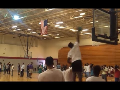 Jaylen Brown, Celtics star, dunks on child