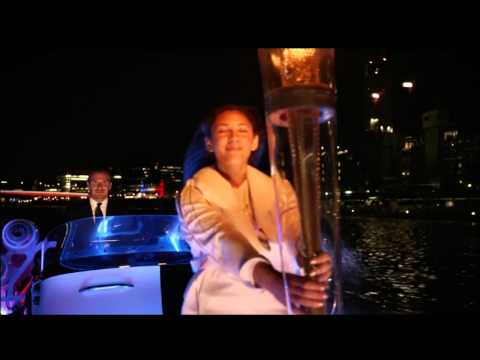 Beckham like a BOSS in a boat olympic torch
