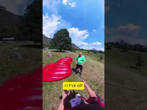 Watch how this crazy Slovenian man responds to paraglider landing in his backyard 😨